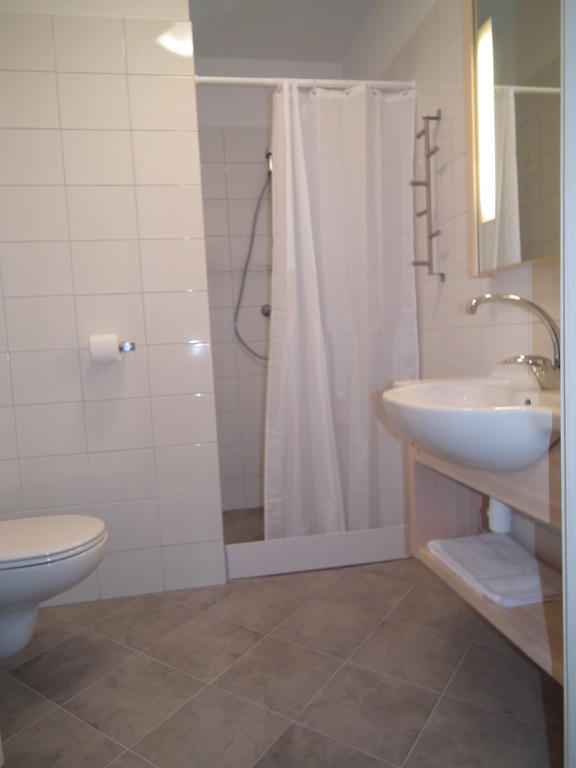 5A Hotel Services Koszalin Quarto foto